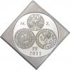 Plaketa k 50. narozeninám 2011. Tři mince, monogram, nápis PF 2011. Nesign. (Soušek). Jednostr. cín 42x42 mm, tl. 2,0 mm, raž. 34 ks